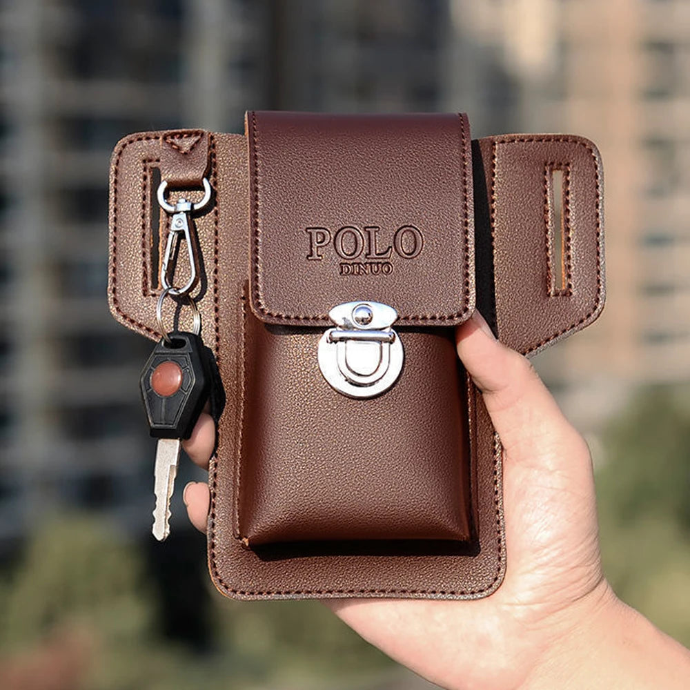 A brown leather waist bag with a flap and strap is shown being held by a hand.