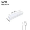 A white motion sensor LED night light with a rectangular body and a connector cable.