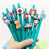A hand holds a pack of six medical theme ballpoint pens featuring various doctor and nurse characters.
