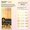 A set of six warm yellow acrylic painting gel pens in a grid layout with corresponding writing colors.