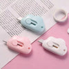 A set of multi-color rabbit cloud utility knives, including a light blue and pink knife, resting on a white paper.