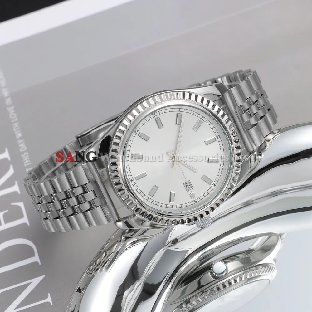 A close-up of a polished stainless steel watch with a white dial and silver bracelet on a gray background.
