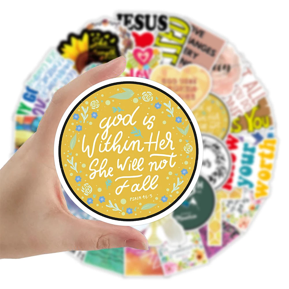 A hand holds a circular arrangement of inspirational Bible verse stickers featuring verses like God is Within Her She Will No