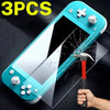 A hand holds a blue tempered glass screen protector for a Nintendo Switch console.