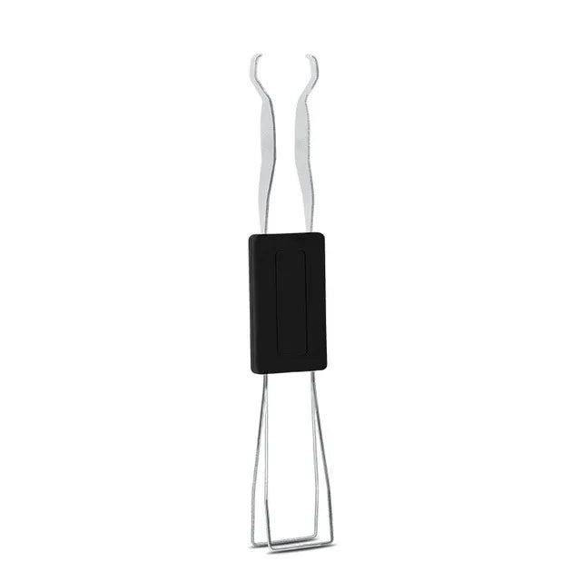 Extractor de teclas para teclado mecánico con mango de metal.