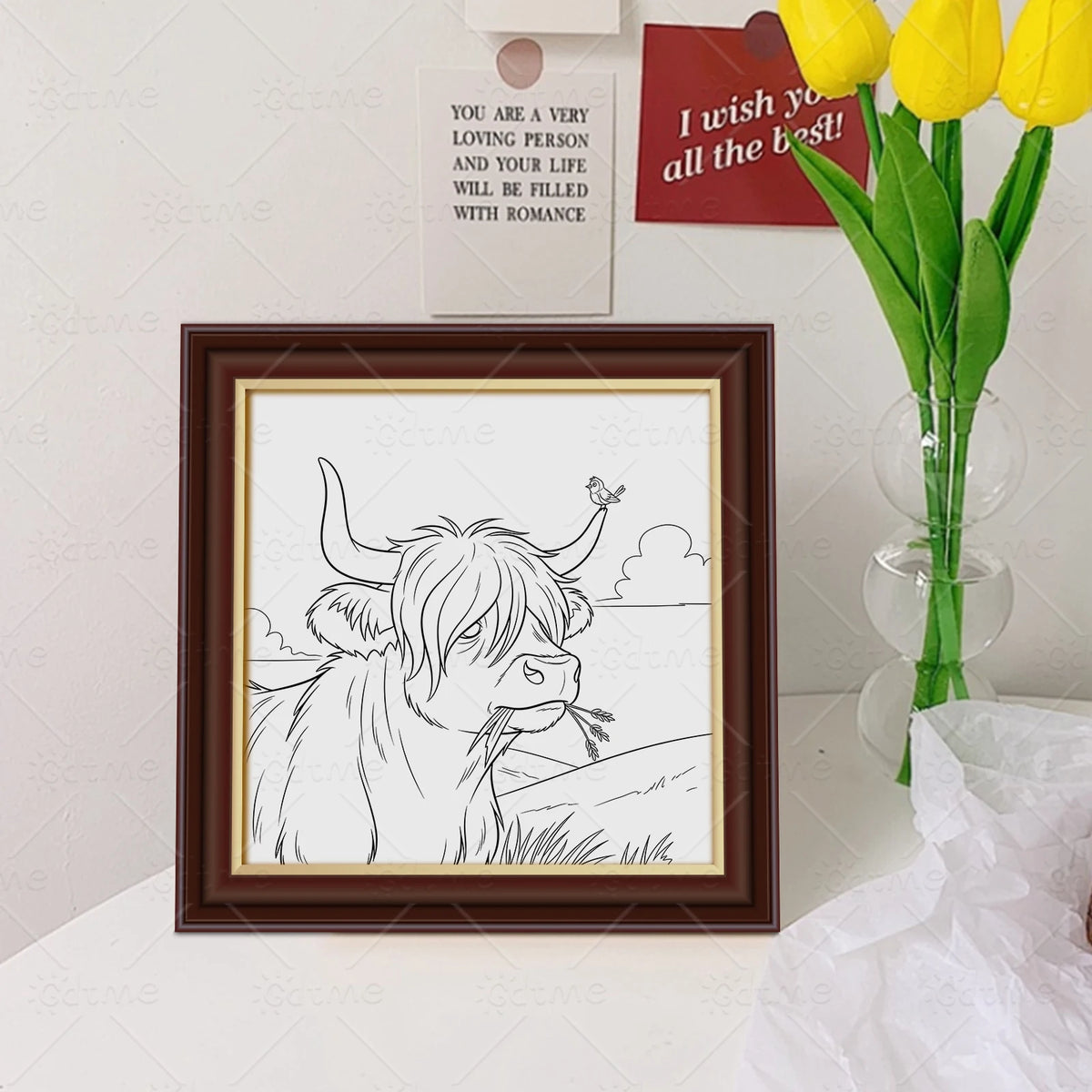 A framed line drawing of a cow's head with horns and a small bird on its back for an adult coloring book.