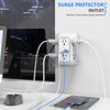 A white surge protector power strip with multiple outlets and USB ports plugged into a wall socket.