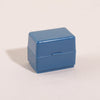 A small, rectangular blue roller stamp used for privacy protection on confidential documents.
