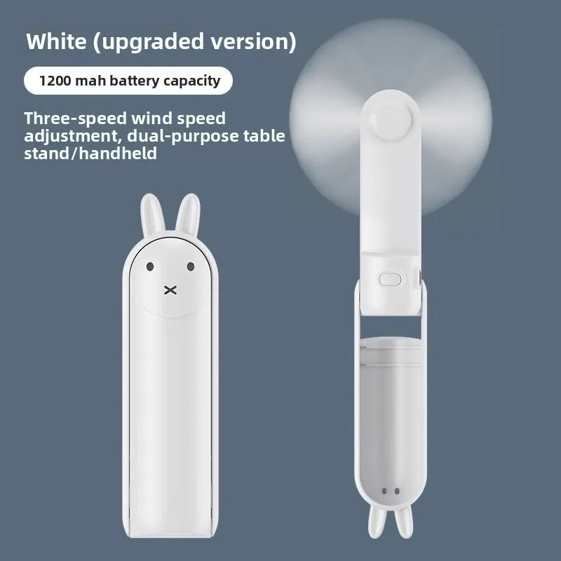 White upgraded version of a portable foldable rabbit mini fan with 1200 mah battery capacity