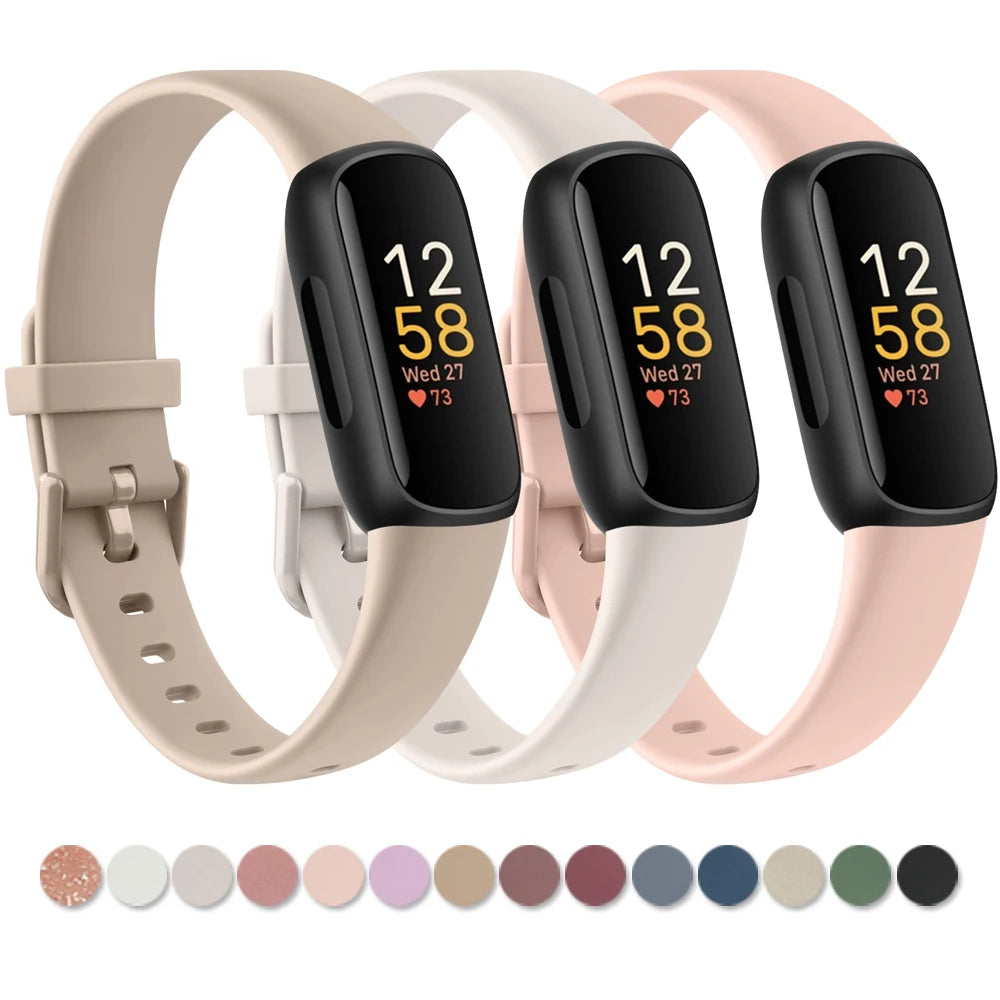 A set of four silicone replacement straps in various pastel colors for a Fitbit Inspire Series watch.