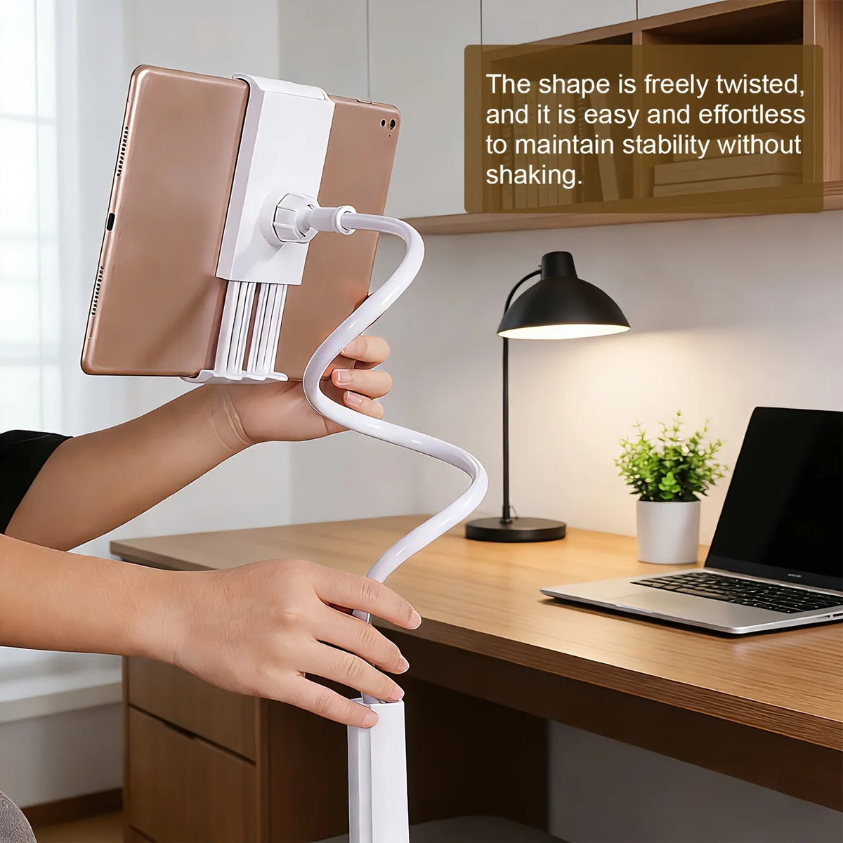 A hand holds an adjustable tablet and phone holder with a flexible neck for stable viewing.