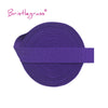 Purple Bristleglass elastic hair ties and trims rolled up for display