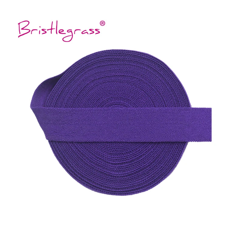 Purple Bristleglass elastic hair ties and trims rolled up for display