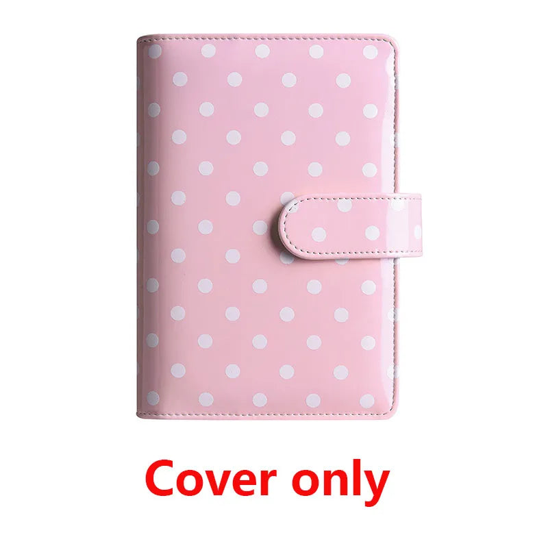 Pink reusable PU leather binder cover with white polka dots and a flap pocket