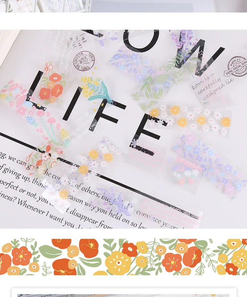 A sheet of decorative transparent washi tape featuring floral and nature-inspired designs on a white background.