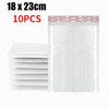 A stack of 10 self-sealing pearl film bubble shipping bags, white and clear, shown next to a flat sheet.