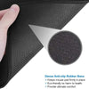 Close-up of a dark gray anti-slip rubber base for a gaming mousepad