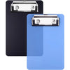 A close-up view of a black clipboard and a light blue clipboard, both featuring a silver clip for holding notes.