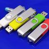 A collection of colorful metal USB 2.0 flash drives displayed on a blue surface.
