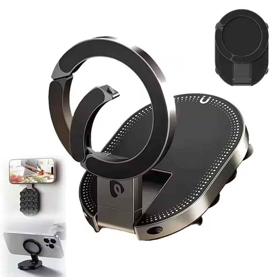 A black magnetic phone holder mount featuring a circular ring and a flat base for desk or wall use.