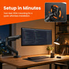 A black monitor arm is mounted to a wooden desk, demonstrating tool-less VESA mounting for quick installation.