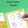 A hand is drawing fruit outlines in a yellow notebook, demonstrating groove practice for kids.