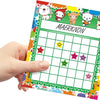 A hand holds an incentive reward chart for kids behavior tracking featuring colorful characters and a grid for tracking.