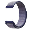 A close-up view of a purple nylon loop watch strap for a kids' watch.