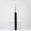 A black retractable hand pointer stick with a white hand, displayed on a clear acrylic stand.