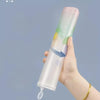 A hand holds a transparent and pink Cherry Blossom A4 zipper file bag, showing an arrow pointing to the interior.