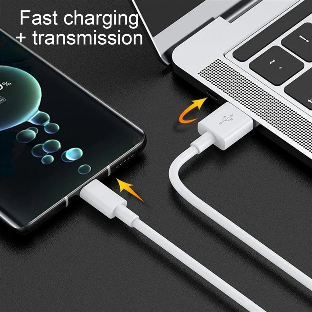 A white USB-C fast charging cable is shown connecting a smartphone to a laptop, highlighting fast charging and transmission.
