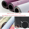 Rolls of thick, precision seamed rubber desk mat mousepads in various colors and textures