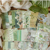 A collection of vintage floral and botanical paper, including patterned sheets, leaves, and decorative elements for scrapbook