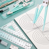 A set of nine geometry drawing tools including pens and a ruler displayed on a white sheet.