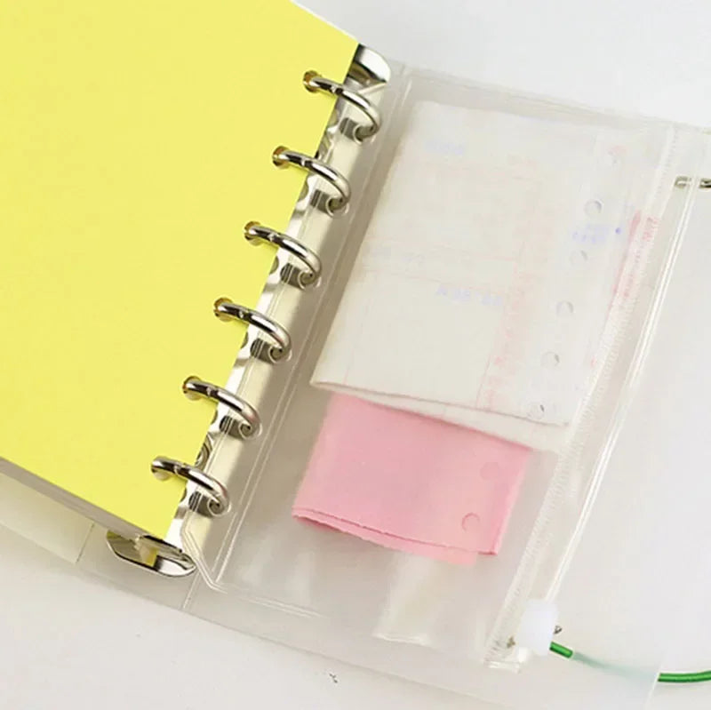 A set of ten zippered PVC binder pockets designed for A5 to A7 notebooks.