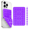 A silver smartphone case with a purple silicone suction cup phone holder and an accessory