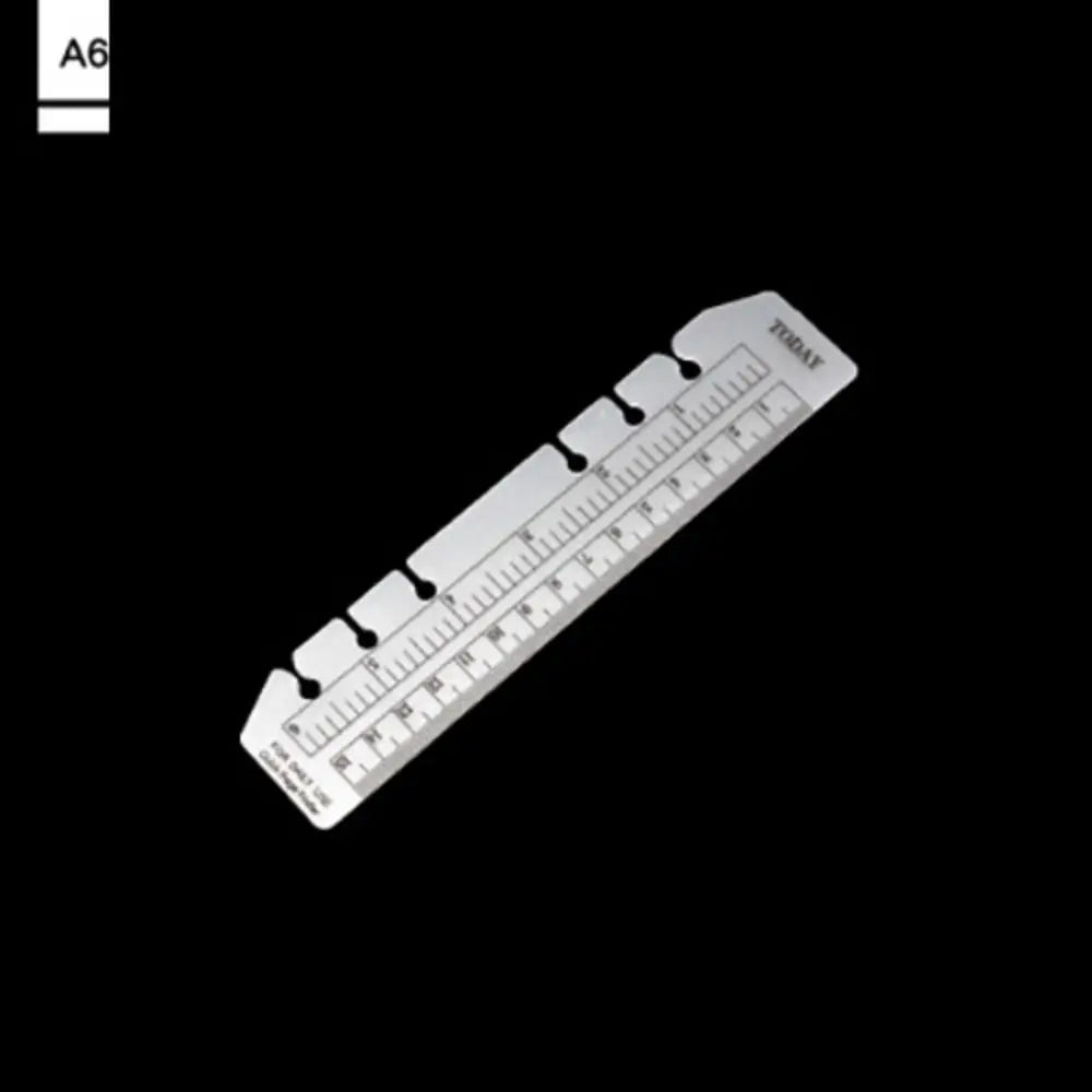 Transparenter PVC-Notizbuch-Lesezeichen mit Millimeterangaben.