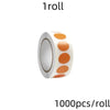 A roll of round assorted color dot labels for organization, showing a cylindrical roll with orange and white dots.