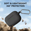 A black silicone protective case for AirPods Pro with a metal keychain attached, shown against a rocky background.