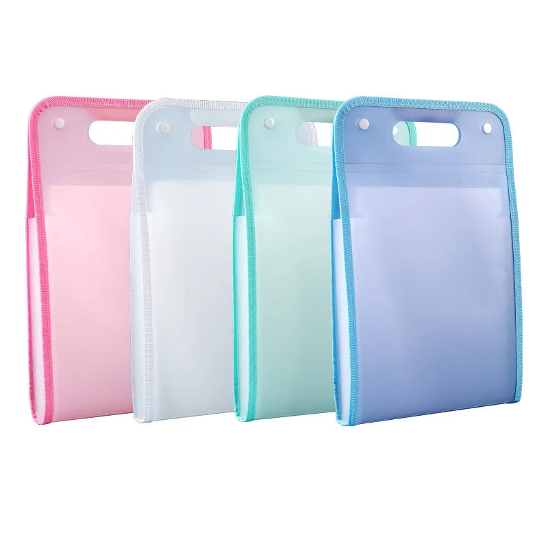 A set of four accordion file organizers in pink, white, mint green, and light purple.
