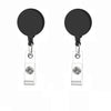 A set of five black retractable badge reels with crocodile clips.
