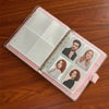 A pink transparent photo card binder sleeve displaying several portrait photos.