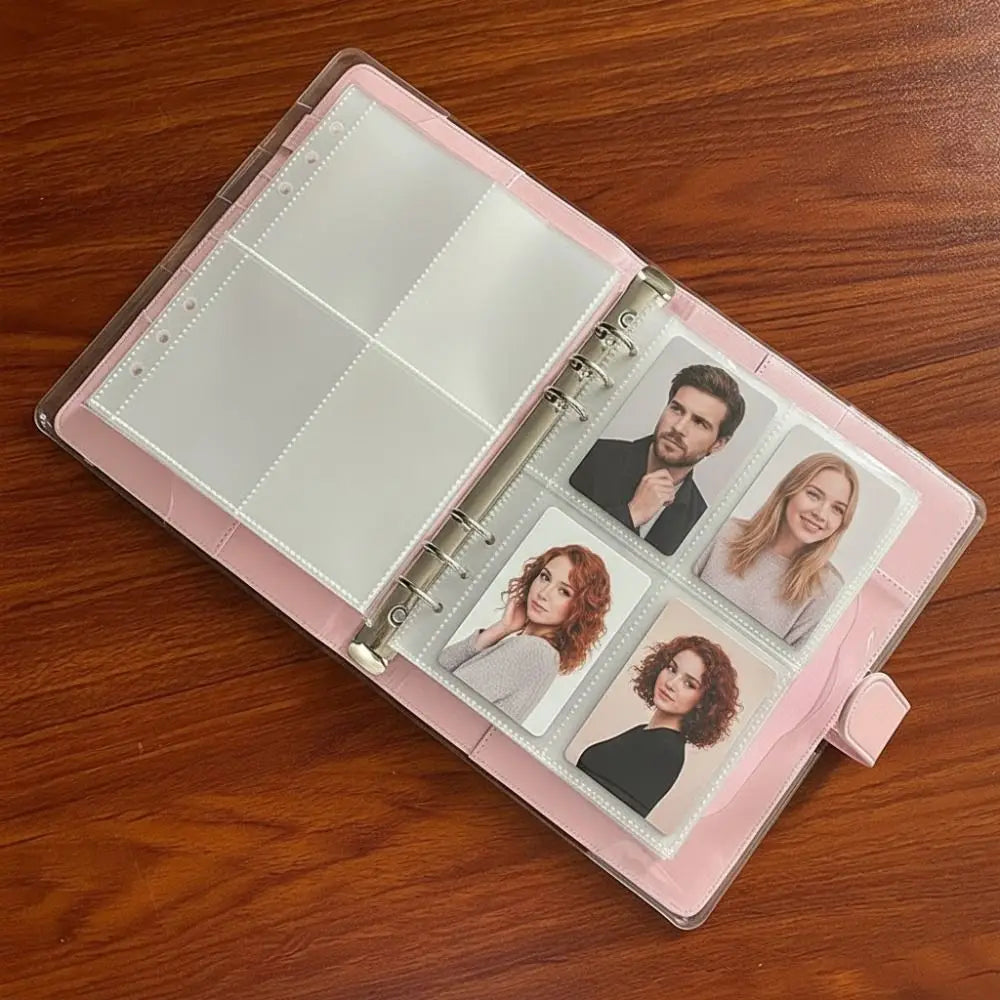 A pink transparent photo card binder sleeve displaying several portrait photos.