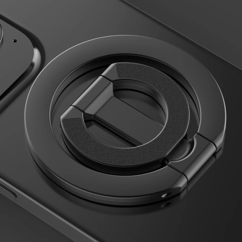 A close-up view of a black MagSafe double-sided phone ring holder mechanism.