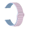 A light pink adjustable magnetic loop watch band shown from the side.