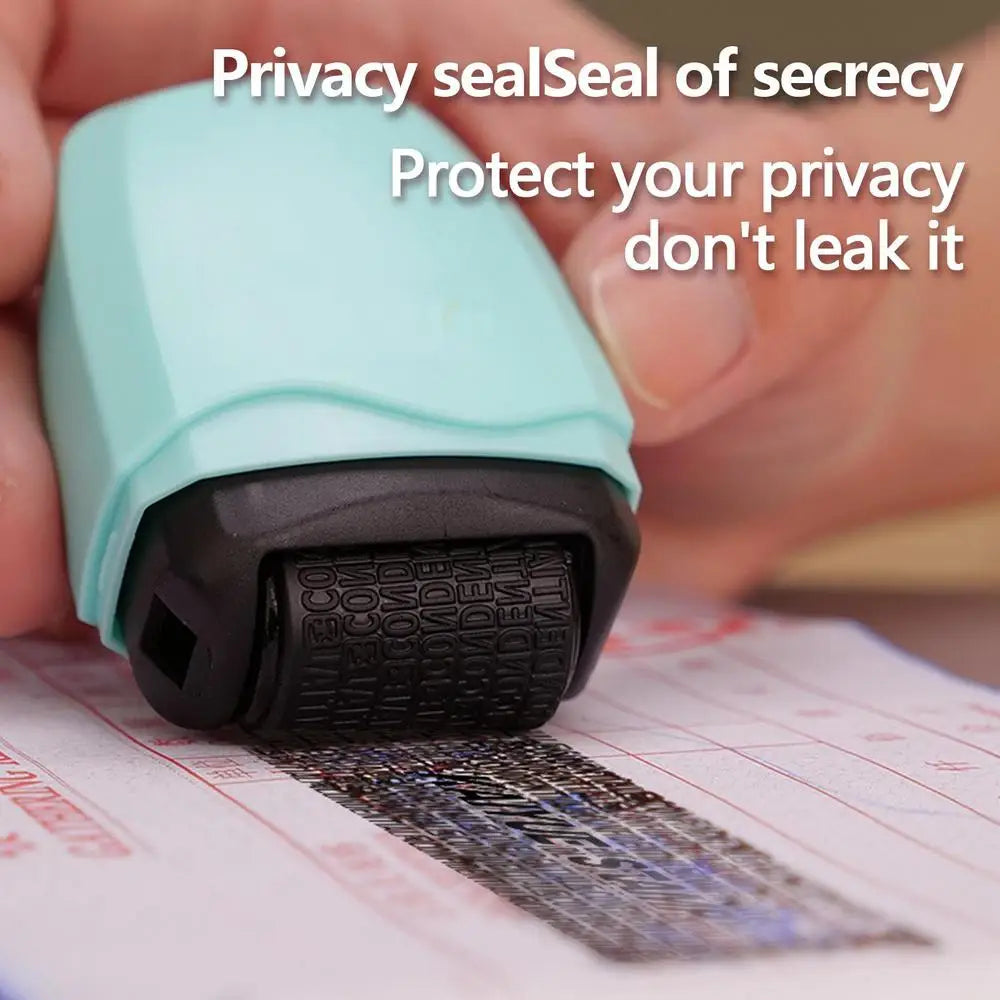 A hand is using a light blue roller stamp to apply a dark ink impression onto a piece of paper.
