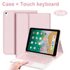 Pink case and touch keyboard for an iPad, shown with a hand interacting with the device.