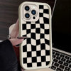 A white silicone phone case with a black and white checkered pattern is shown on a smartphone.