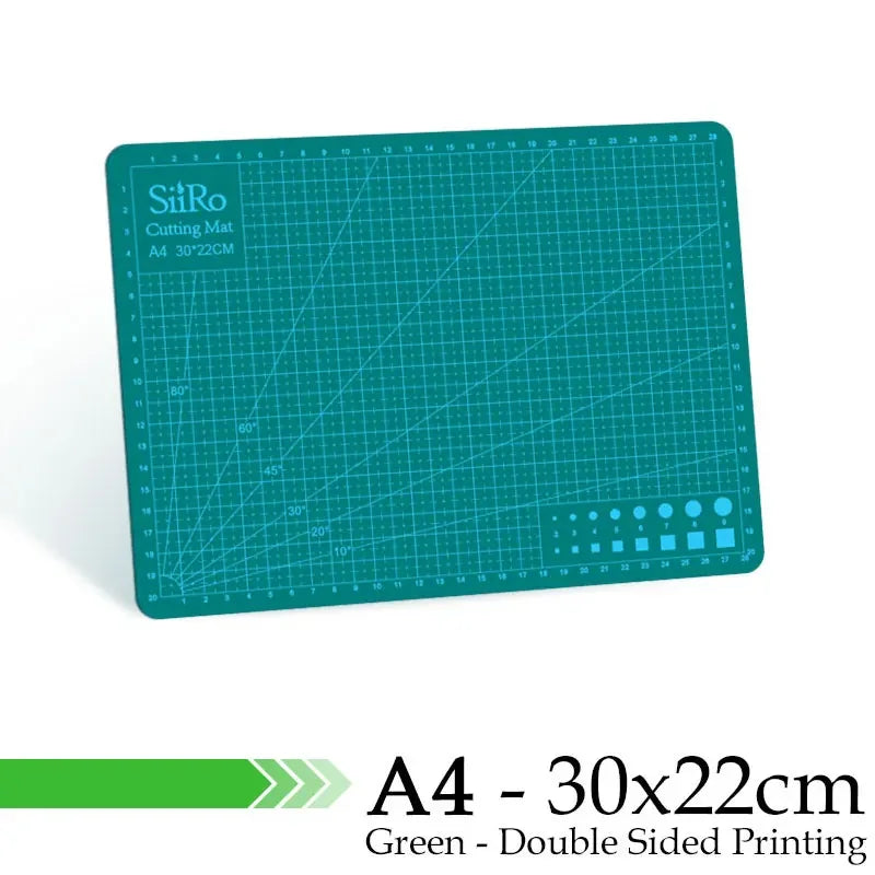 A green A4 cutting mat with grid guides and double-sided printing.