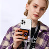 A woman holds a smartphone featuring a dynamic pixel display, showcasing its practicality and appearance.